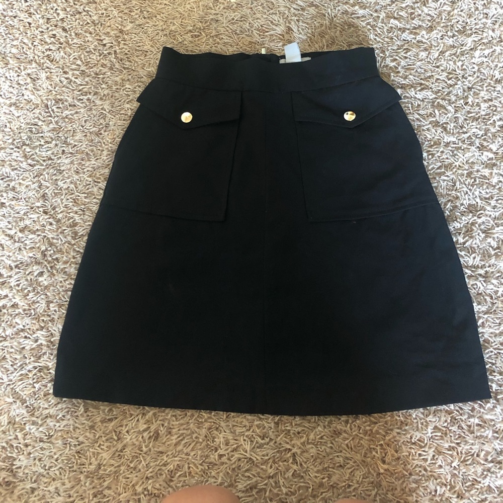 Black mini skirt with pockets